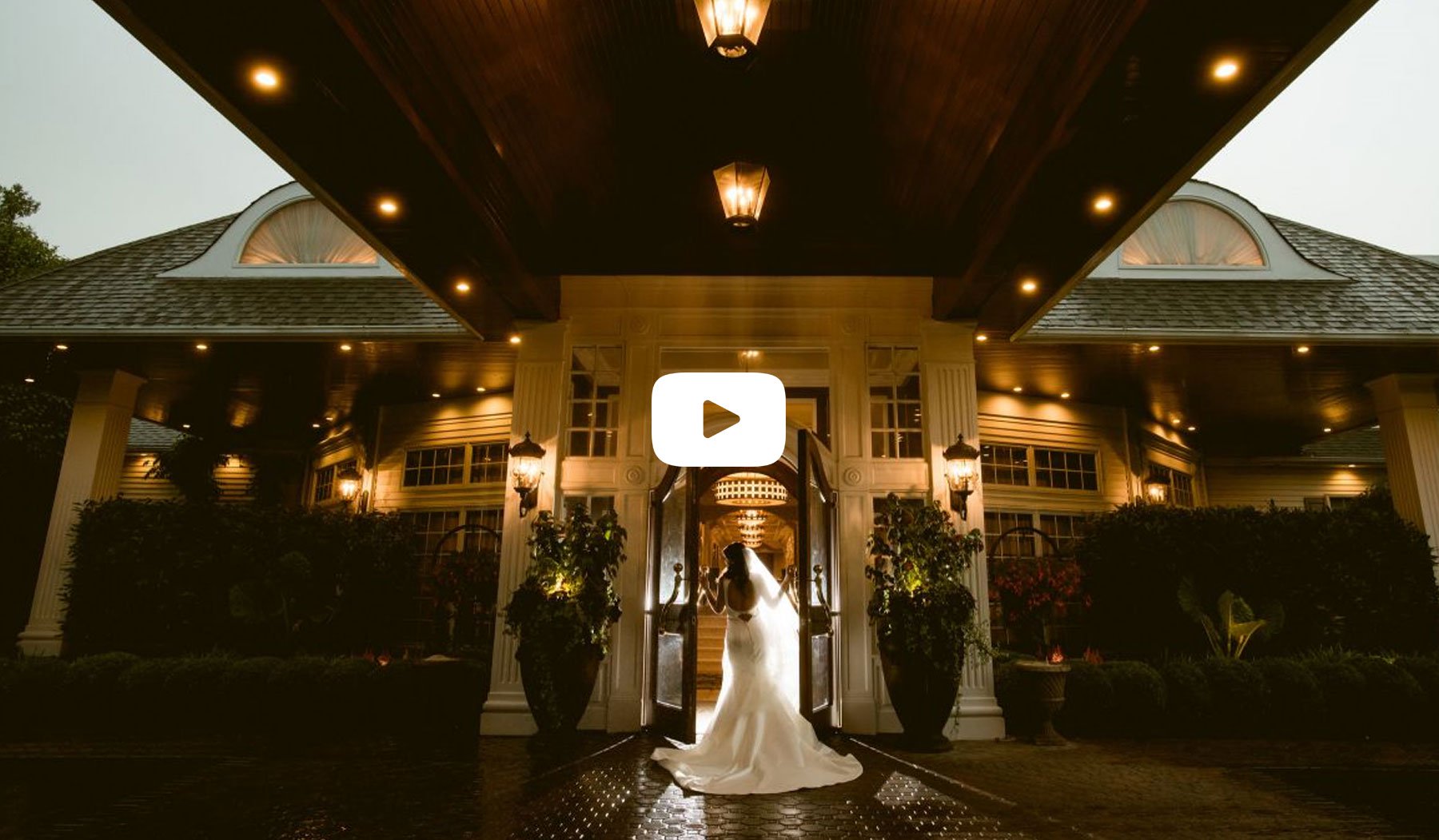 Bride in front of Watermill Caterers Venue